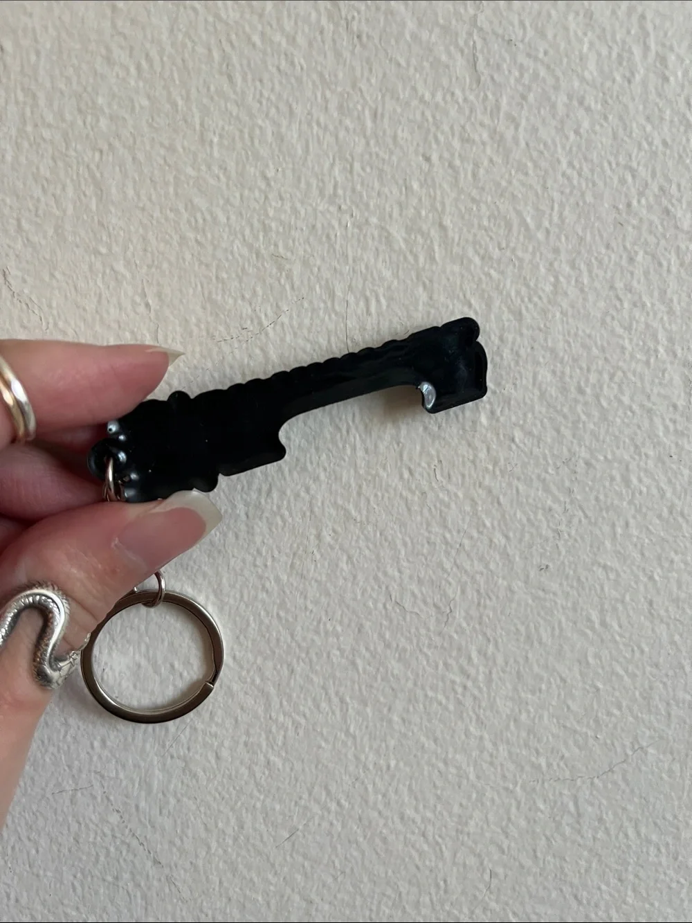 UNWANTED Black & White Skull Keychain